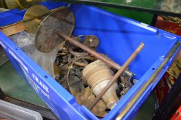 A box of decorative metal ware.