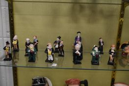 A group of small Royal Doulton figures, Doulton characters and others.