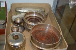 Two pairs of modern silver coasters and other silver items.