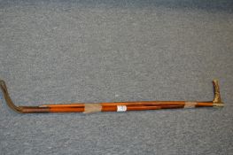 A riding crop and swagger stick.