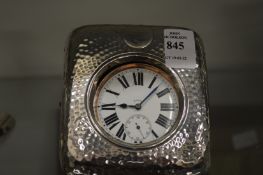A Goliath pocket watch in silver and leather travelling case.