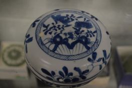 A Chinese blue and white box and cover.