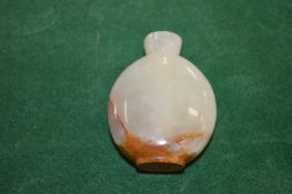 A Chinese hardstone snuff bottle.