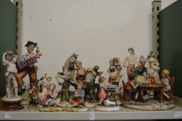 A good collection of Capodimonte and similar figures and figure groups.