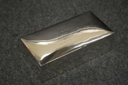 A presentation silver table cigarette box.
