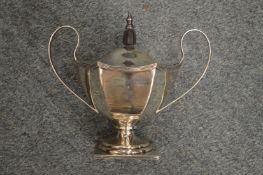 A continental silver hexagonal shaped pedestal sugar bowl and cover.