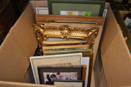 A box of paintings and prints etc.