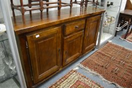 A continental oak sideboard.