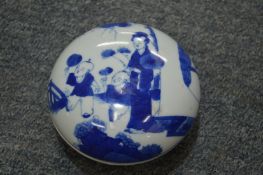 A Chinese blue and white porcelain box and cover.