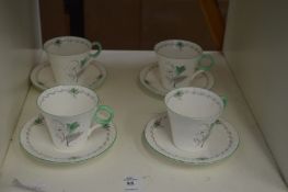 Four Shelley cups and saucers, one with a rim chip.