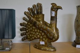 An unusual eastern lacquer knife block and knives modelled as an exotic bird.
