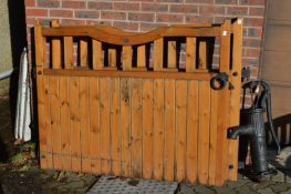 A pair of wooden driveway gates.