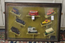 A cased set of model cars and vans.