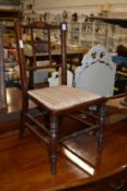 An inlaid mahogany child's chair.