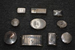 A collection of silver snuff boxes, card case, a vesta case etc.