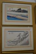 A pair of Japanese wood block prints, framed and glazed.