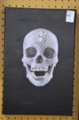 After Damien Hirst, Crystal Skull, a photographic print on canvas.