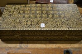An eastern decoratively inlaid backgammon board.