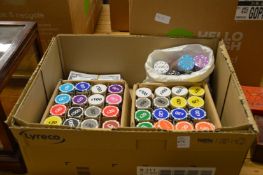 A large quantity of poker chips and pretend bank notes.