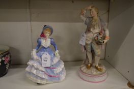 A Doulton figurine ‘Hannah’ and a continental figure of a gentleman.