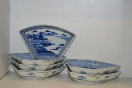 A set of six Chinese blue and white dishes.