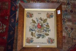 A Victorian embroidered picture of a bird and flowers, signed and dated M. J. Littledale 1839.
