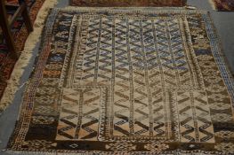 A small Persian beige ground prayer rug.