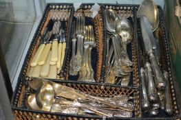A large quantity of plated wares to include cutlery.