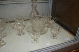 A cut glass decanter, a glass rinser, jelly cups etc.