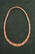 An 18ct gold fringe necklace.