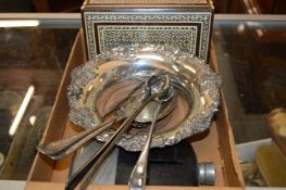 A decanter coaster, a cigarette box etc.