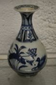 A small Chinese blue and white vase.