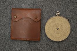 A Fowler's long scale calculator in a leather case.