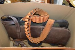 Gun slips and a cartridge belt.