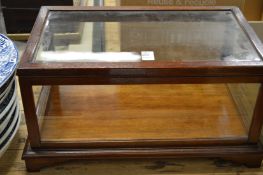 A small table top display cabinet.