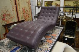 A Roche Bobois leather upholstered day bed.