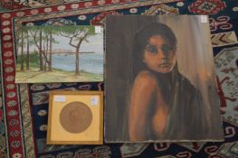 A small circular picture of a child and two other paintings.