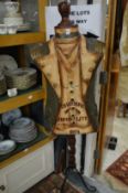 A decorative tailor's dummy.