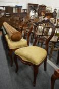 Three Victorian style mahogany dining chairs.