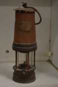 A miner's lamp.