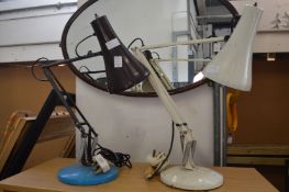 Two angle poise lamps.