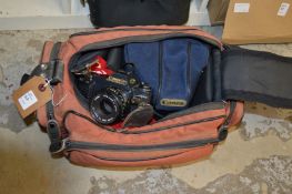 A bag containing camera equipment.