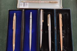 A quantity of pens, boxed.