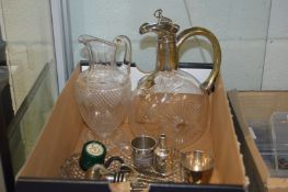 A claret jug with plated mounts and other items.