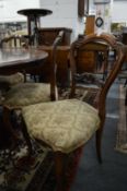 Three Victorian rosewood dining chairs.