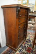 A Victorian walnut Wellington chest.