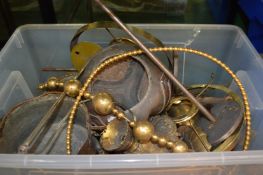 A box of decorative metal ware.