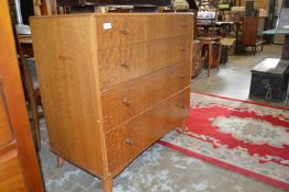 A mid-century four drawer chest.
