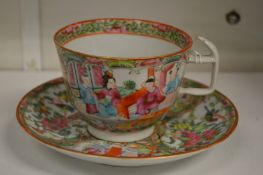 A Canton cup and saucer.