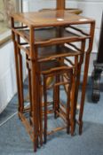 A nest of four Chinese hardwood tables.